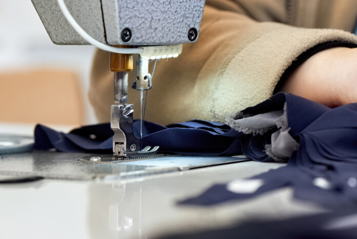 Woman working on a sewing machine